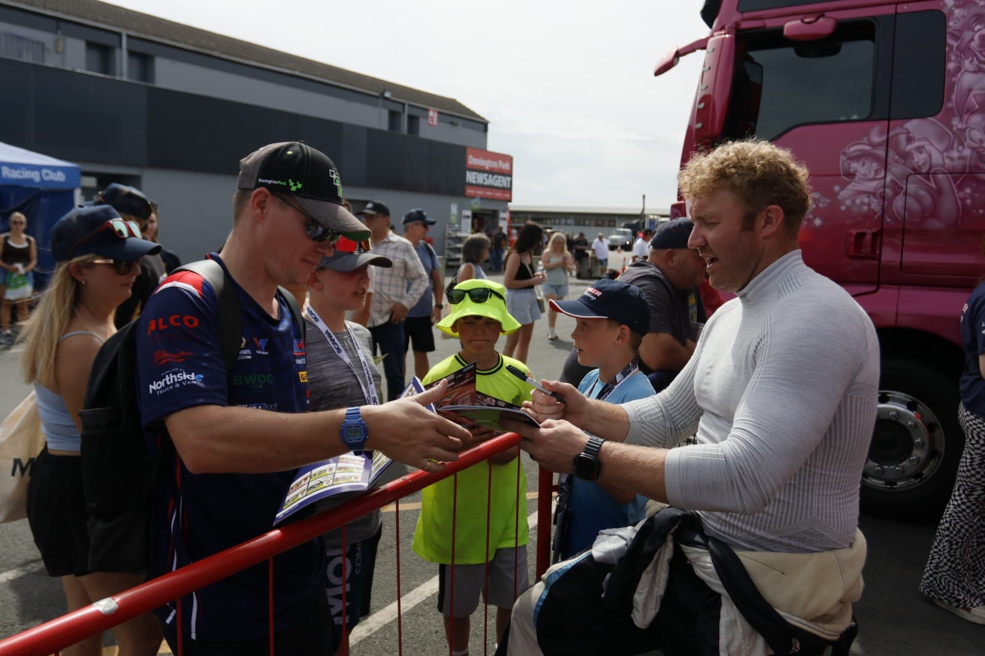 John Bowler meeting a line of supporters at Donington Park